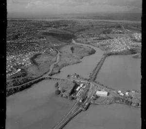 Orakei Basin and Ngapipi-Kepa Roads with Orakei Road Bridge and Train Station in foreground, Hobson Bay, Auckland City