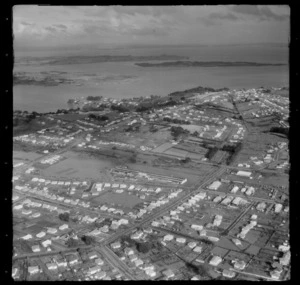 Mount Roskill with unidentified large building with Carr and Hayr Roads, looking to Hillsborough and the Manukau harbour beyond, Onehunga, Auckland