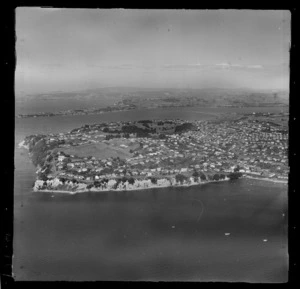 Achilles Point with Cliff Road and Glover Park, Saint Heliers coastal settlement with Bucklands Beach beyond, Auckland City