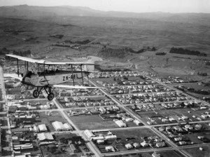 Simmonds Spartan biplane ZK-ABL over Dannevirke - Photograph taken by Newham's Photo Service
