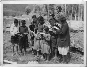 Maori children at an open air Sunday School class at Ruatahuna