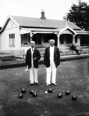 Two unidentified men at a bowls club