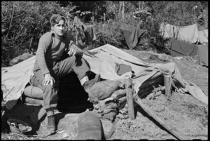 J A D Vernon in front of his bivvy on the mountainous 5th Army Front in Italy during World War II - Photograph taken by George Kaye