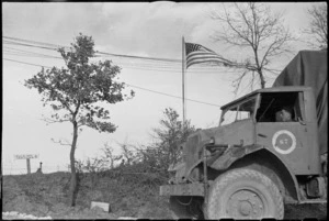 NZ Division truck on 5th Army Front passes American unit in southern Italy, World War II - Photograph taken by George Kaye