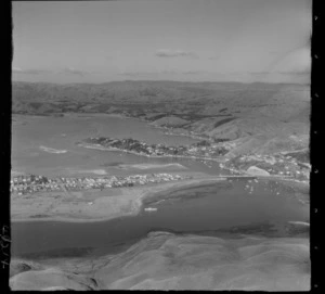 Mana coastal village with Ngatitoa Domain rugby field and Porirua Harbour channel and Paremata Bridge, with Golden Gate Peninsula and Pauatahanui Inlet beyond, Wellington Region