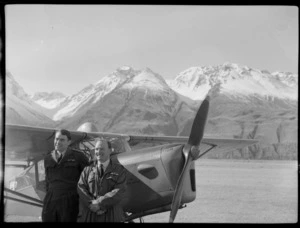 Mount Cook Air Services Ltd, Auster aircraft and two unidentified men during the preparation for the Antarctic Expedition, Mount Cook Airfield, Mount Cook National Park, Canterbury Region