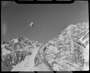 Mount Cook Air Services Auster ZK-BLZ Ski Plane over the Tasman Glacier with snow covered mountains beyond, Mount Cook National Park, Canterbury Region