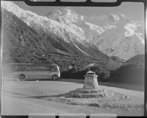 Mount Cook and Southern Lakes Tourist Coach at the Hermitage Mount Cook Village with Mount Sefton beyond, Mount Cook National Park, Canterbury Region