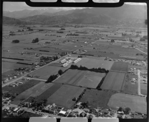 Motueka Primary School on Grey and Whakarewa Streets next to Rugby Park, with surrounding farmland and mountains beyond, Nelson Region