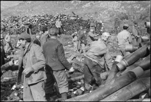 Italians stacking charge cases near the Monte Cassino Front, Italy, World War II - Photograph taken by George Kaye