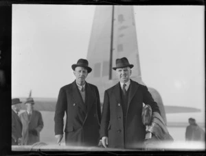 Fred Doidge and Sidney Holland, Members of Parliament, at an airport