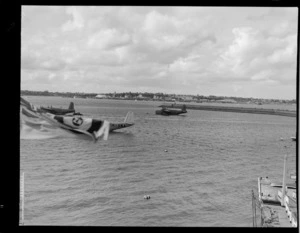 Flying boats, including a Short S25 Sunderland and a Short S23 Empire, at anchor on Mechanics Bay, Auckland