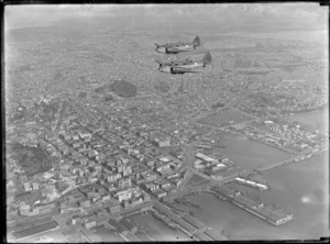 Royal New Zealand Air Force Airspeed Oxford aeroplanes, in flight over Auckland city
