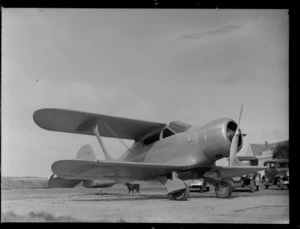 A Beechcraft aeroplane, parked at an unidentified location