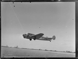A Lockheed Model 10 Electra ZK-AFE, in flight over an unidentified location