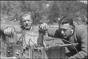 O C Chapman and K G Brown charging batteries on the Cassino Front in Italy, World War II - Photograph taken by George Kaye