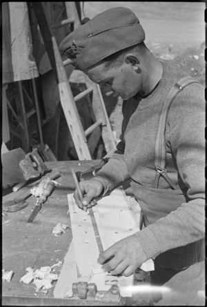 L Bernstein engaged in army carpentry work on the Cassino Front, Italy, World War II - Photograph taken by George Kaye