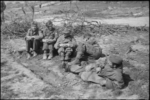 German prisoners, captured on the Cassino Front, rest while awaiting a meal, Italy, World War II - Photograph taken by George Kaye