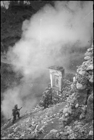 NZ Infantry exercise showing soldiers approaching area under smoke screen cover, Italy, World War II - Photograph taken by George Kaye