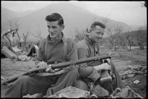 NZ front line infantry soldiers O S Sinclair and C R Monaghan recently engaged in heavy fighting around Cassino, Italy, World War II - Photograph taken by George Kaye