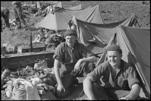 R Hamilton and R J Scarlett of NZ Infantry rest behind the line on the Cassino Front, Italy, World War II - Photograph taken by George Kaye