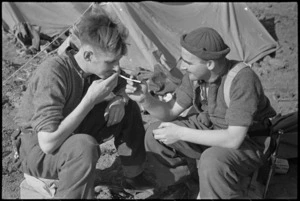 NZ Infantrymen H L Pither and E L D Baker resting behind the line on the Cassino Front, Italy, World War II - Photograph taken by George Kaye