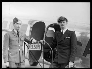 Portrait of R O Chatfield in RNZAF uniform and Captain A M F Alexander of Union Airways in front of a Nelson bound plane, Rongotai Airport, Wellington