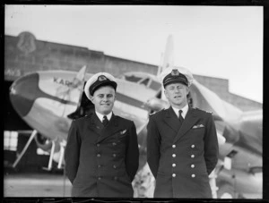Portrait of Captains (L to R) D T Kealey and F C Allen of Union Airways in front of a plane, Rongotai Airport, Wellington