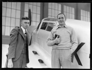 Portrait of (L to R) Ted Hughes and A Prichard of PWD Aerodrome Services with Percival Proctor plane ZK-AHV, Rongotai Airport, Wellington