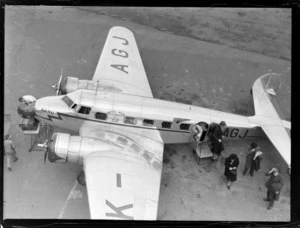 Lockheed Electra aircraft ZK-AGJ, Rongotai airport, Wellington, top view, passengers disembarking