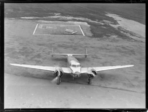 Lockheed Electra aircraft, Rongotai - front view taking off