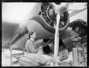 Checking mail aboard Lockheed Lodestar aircraft 'Karoro', Rongotai airport, Wellington