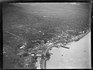 Apia Harbour coastal settlement with forest beyond, Western Samoa