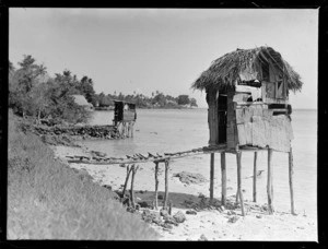 Local community toilets built over the sea, Apia Harbour, Western Samoa