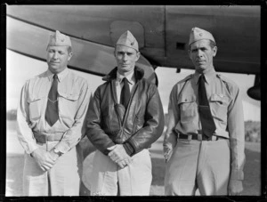 Portrait of Captains B C Balch, G R Maxwell and F F Ralph (L to R) in front of a Pan American Airways plane, location unknown