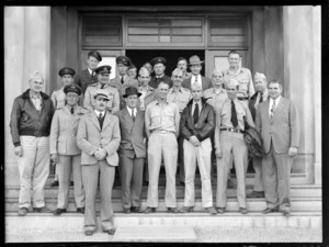 Group portrait of Pan American Airways and Air Department personnel, Whenuapai Airport, Auckland City