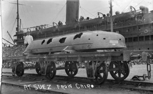 Damaged pontoon in front of a troop ship, Egypt