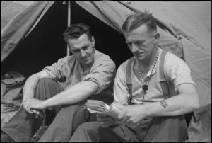 E T Richards and L K McGregor, NZ Infantry, resting behind the line after heavy fighting in Cassino, Italy, World War II - Photograph taken by George Kaye