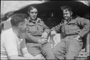 Three NZ Infantry soldiers relaxing behind the line after the heavy fighting for Cassino, Italy, World War II - Photograph taken by George Kaye