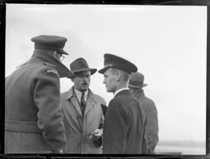Robinson E, A. (Robby) of Tasman Empire Airways, Buck, captain of B.O.A.C. at Whenuapai, on arrival of Lancastrian