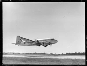 Douglas Skymaster (DC4) aircraft RAFTC [Royal Air Force Technical College], taking off, Whenuapai starboard view