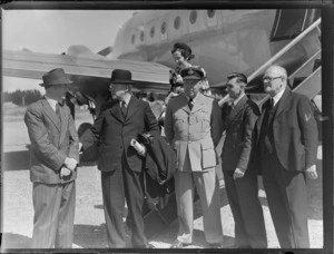 Fraser, Rt Hon Prime Minister at Whenuapai prior to departing for England by RAFTC [Royal Air Force Technical College], DC4 aircraft. With L to R - E.A. Robinson Squadron Leader Adams, Mrs J. Kemp, Leo White and Rt Hon WJ Jordan