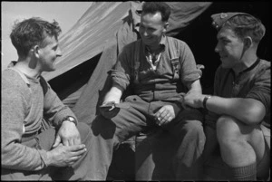 Three NZ Infantrymen resting behind the line after recent fighting for Cassino, Italy, World War II - Photograph taken by George Kaye