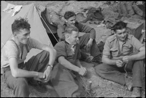 NZ Infantry soldiers rest immediately behind the line after the recent heavy fighting for Cassino, Italy, World War II - Photograph taken by George Kaye