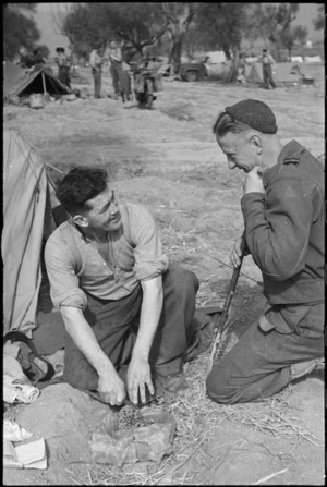 A J Lane and E C Holder, NZ Infantry, resting behind the line after recent heavy fighting in Cassino, Italy, World War II - Photograph taken by George Kaye