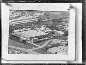 Copy photograph of a drawing showing aerial view of the proposed Hardies Fibrolite Factory on site alongside existing roads and commercial buildings, Penrose, Auckland