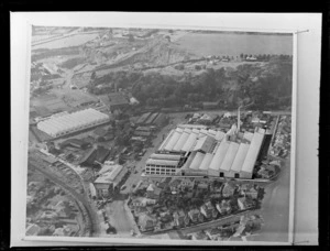 Copy photograph of a drawing showing an aerial view of the proposed Waitemata Brewery factory on site with alongside existing roads and commercial buildings, Otahuhu, Auckland
