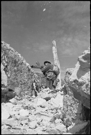 Machine gunner on the Cassino battlefront, Italy - Photograph taken by George Kaye