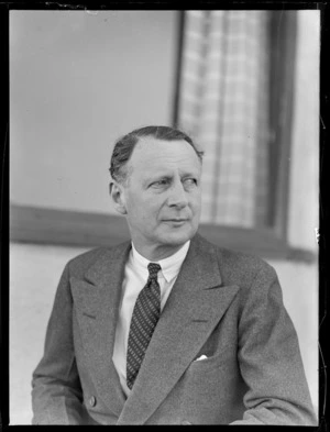 Portrait of Lord Knollys, Chairman of BOAC in front of a building, location unknown