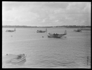 General view of Hobart and Hythe G-AGJM, with other flying boats, Mechanics Bay, Auckland